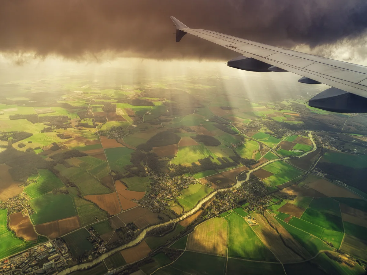 Greening the Skies: Aerospace’s Sustainable Journey & Climate Risks
